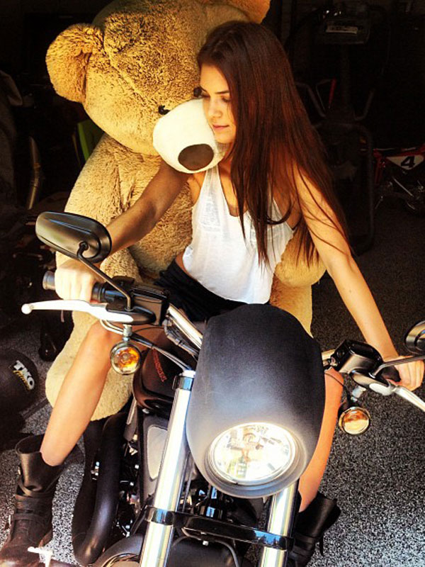 kendall-jenner-with-her-giant-pedobear-riding-on-a-bike.jpg